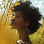 Stylist photography portrait of woman with a large round earring.