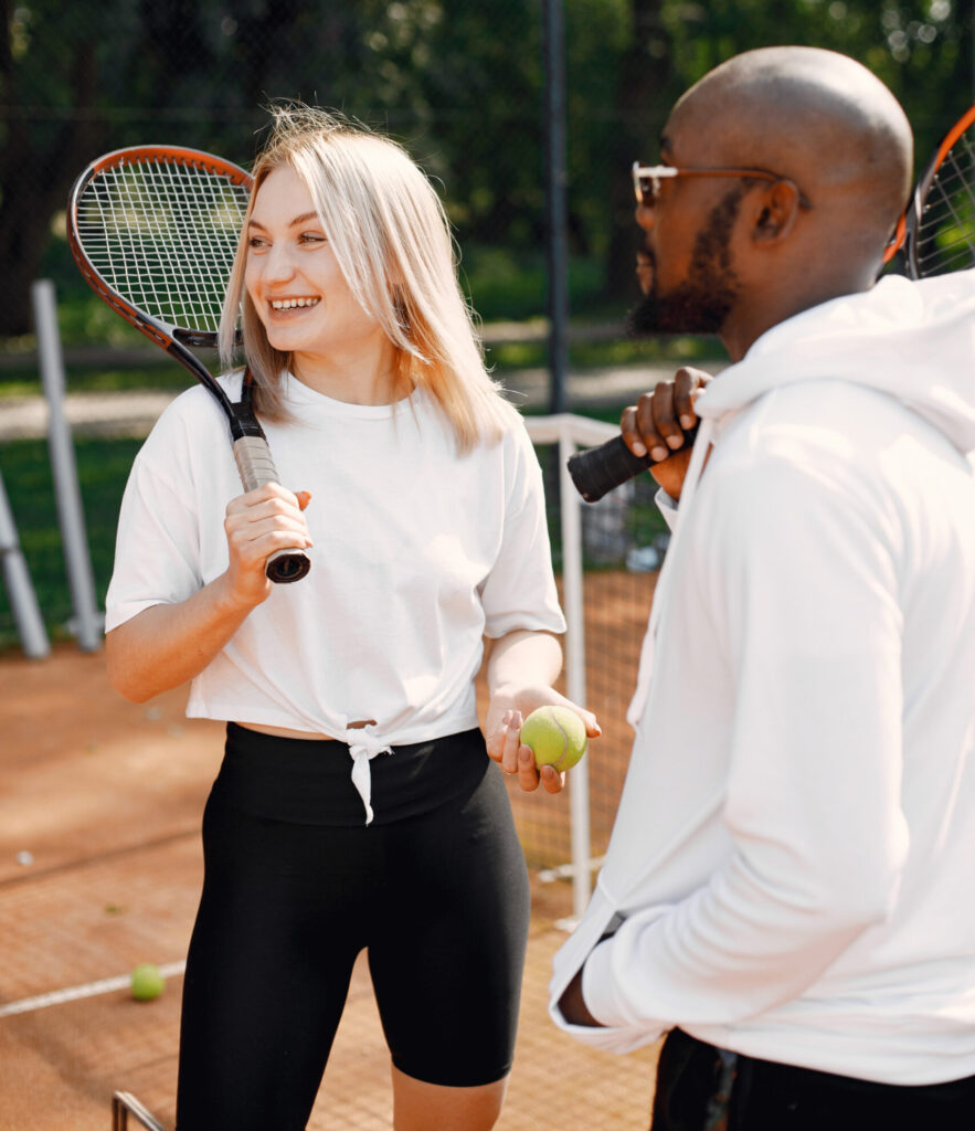 couple playing tennis
