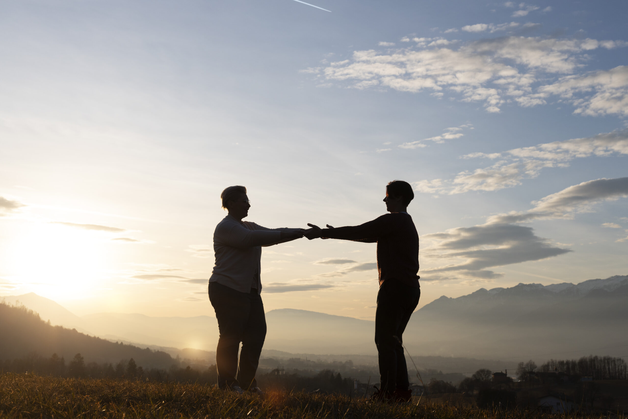 A hand reaching out to help another, symbolizing servant leadership rooted in humility and service