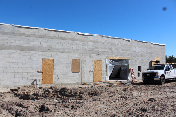 The main plant building will house offices, storage, pipes, and mechanical.