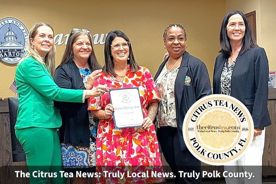 Bartow Assistant City Clerk Kaylee Fussell holds her Certified Municipal Clerk certificate with Mayor Tanya Tucker, City Clerk Jacki Poole and fellow clerks in the Bartow City Commission chambers.